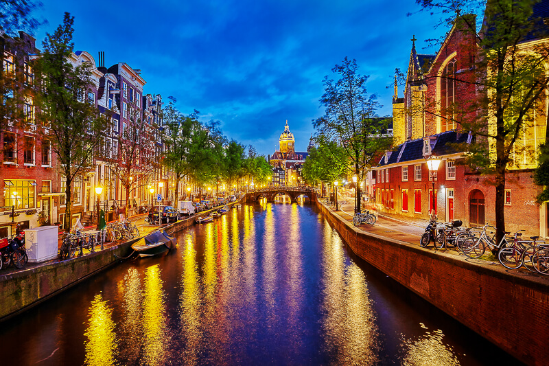 Canal in Amsterdam, The Netherlands - Photo courtesy of iStock/VitalyEdush