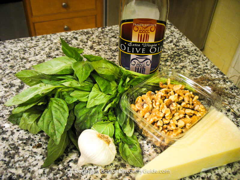 IIngredients for basil pesto:  basil, olive oil, garlic, walnuts, asiago cheese