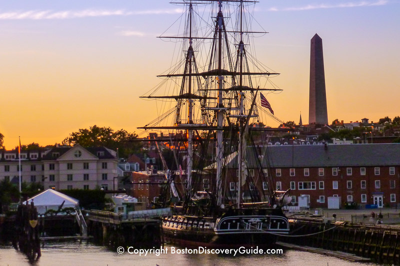 Bunker Hill Monument in Charlestown, with the USS Constitution ("Old Ironsides" in the foreground