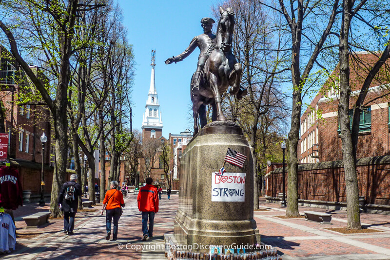 Paul Revere statue in "The Prado" in Boston's North End, with the Old North Church in the background