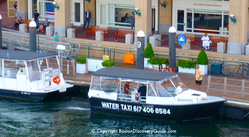 Water taxi at Rowes Wharf next to the Boston Harbor Hotel
