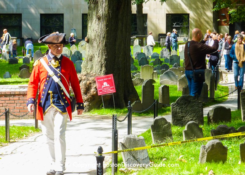 Costumed Freedom Trail tour guide in historic Granary Burying Ground 