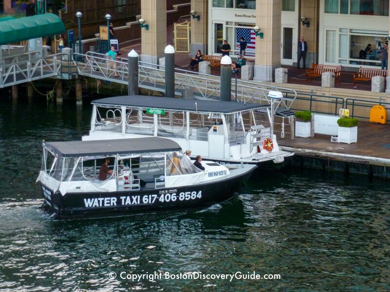 Water taxi pulling up at Rowes Wharf
